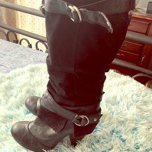 High heeled knee high boots